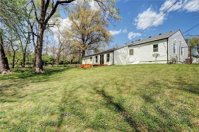 view of yard with central AC