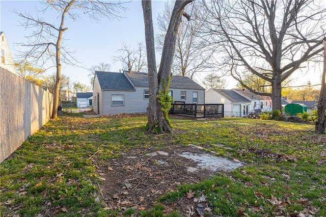 9904 E 60th Ter, Raytown, MO 64133 - view of yard featuring fence and a deck