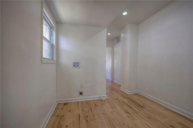 1607 E 37th St, Kansas City, MO 64109 - empty room with light wood-style floors, baseboards, and recessed lighting