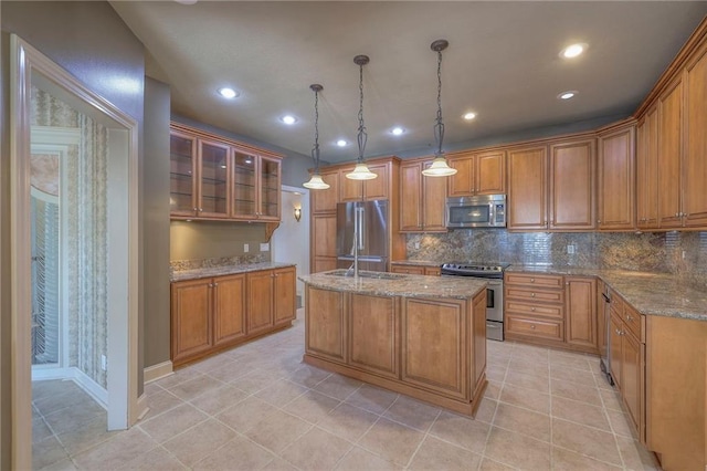 kitchen with stainless steel appliances, recessed lighting, tasteful backsplash, and light stone counters