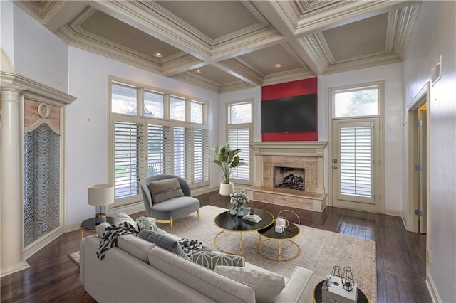living room with coffered ceiling, wood finished floors, beamed ceiling, a premium fireplace, and baseboards