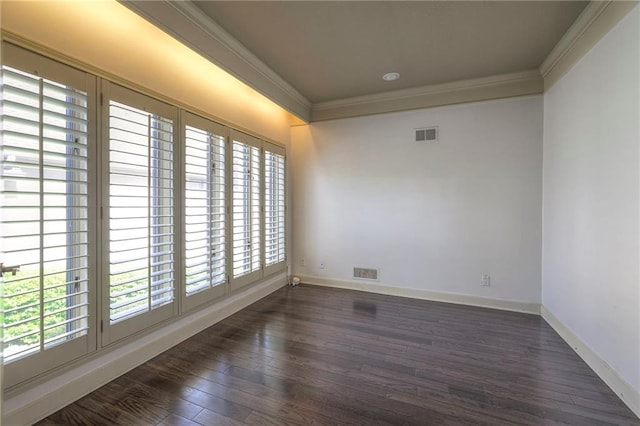 unfurnished room with ornamental molding, visible vents, and a healthy amount of sunlight