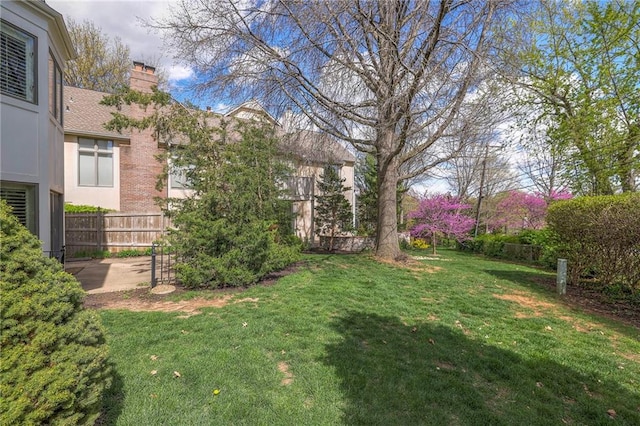 view of yard with fence