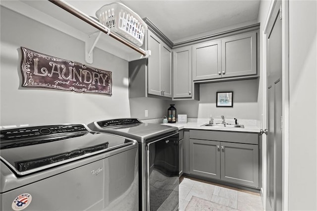 4513 NE Parks Summit Ter, Lees Summit, MO 64064 - washroom featuring a sink, light tile patterned floors, cabinet space, and washing machine and dryer