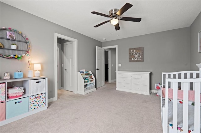 4513 NE Parks Summit Ter, Lees Summit, MO 64064 - bedroom with light carpet, ceiling fan, and baseboards