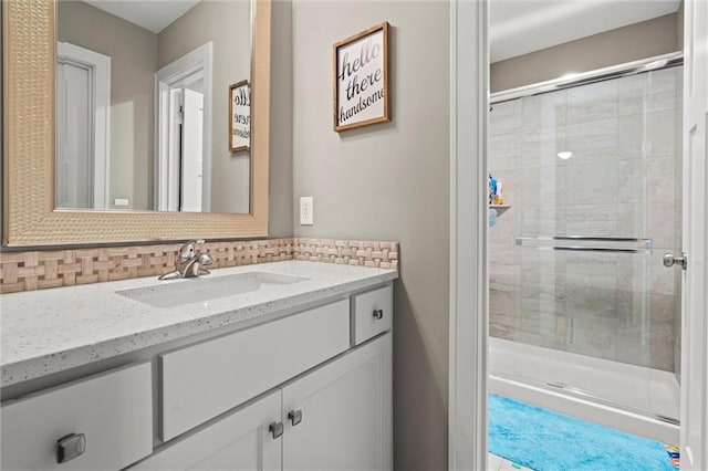 4513 NE Parks Summit Ter, Lees Summit, MO 64064 - bathroom with backsplash, a stall shower, and vanity