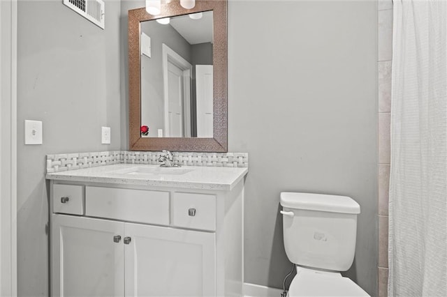 4513 NE Parks Summit Ter, Lees Summit, MO 64064 - full bath with toilet, vanity, and visible vents