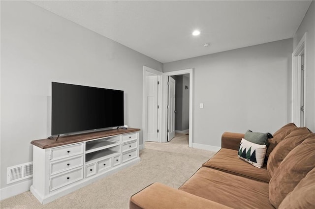 4513 NE Parks Summit Ter, Lees Summit, MO 64064 - living room with visible vents, baseboards, and light colored carpet