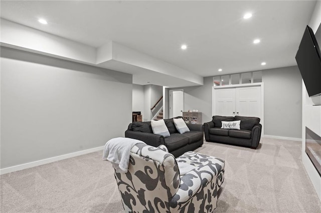 4513 NE Parks Summit Ter, Lees Summit, MO 64064 - living room with baseboards, recessed lighting, light colored carpet, and stairs