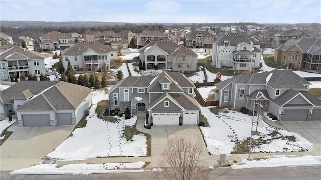 4513 NE Parks Summit Ter, Lees Summit, MO 64064 - snowy aerial view with a residential view