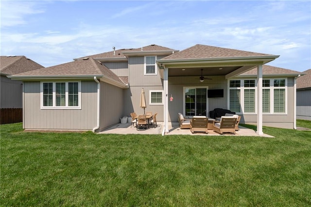4513 NE Parks Summit Ter, Lees Summit, MO 64064 - back of house featuring ceiling fan, an outdoor hangout area, a patio area, and a yard