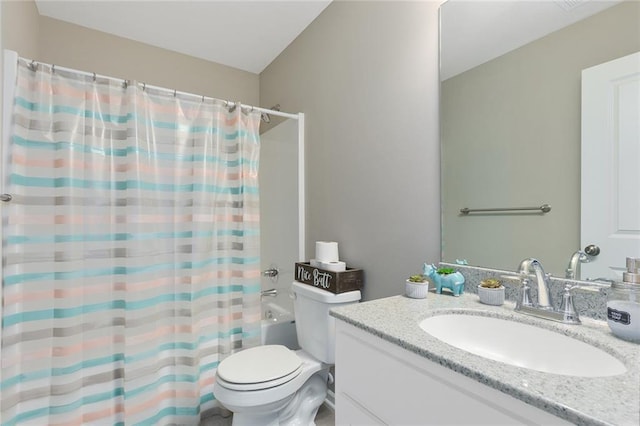 bathroom with shower / bath combo, vanity, and toilet