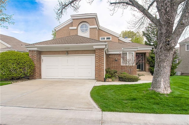 12225 Birch St, Leawood, KS 66209 - view of front of home featuring driveway, a garage, brick siding, and a front yard