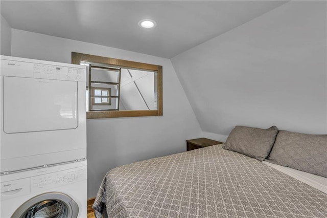 122 W Lou Ann Dr, Lacygne, KS 66040 - bedroom featuring recessed lighting and stacked washer / dryer