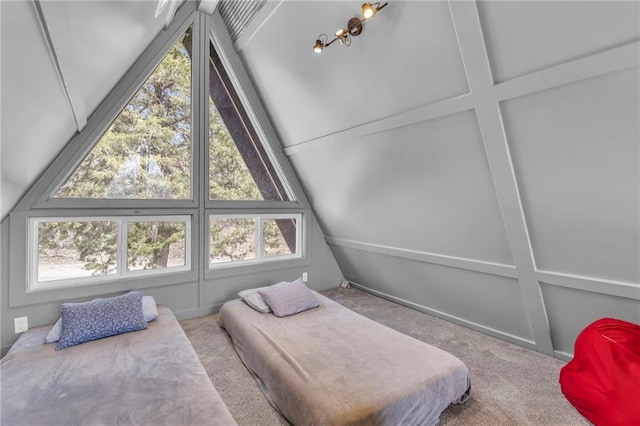 122 W Lou Ann Dr, Lacygne, KS 66040 - bedroom featuring multiple windows, carpet flooring, and lofted ceiling
