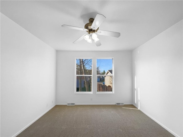 12207 N Pomona Ave, Kansas City, MO 64163 - unfurnished room with carpet flooring, visible vents, and ceiling fan