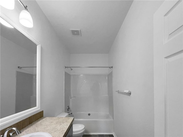 12207 N Pomona Ave, Kansas City, MO 64163 - bathroom featuring visible vents, toilet, vanity, and shower / bath combination