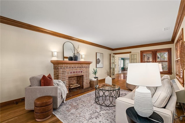 6721 Santa Fe Dr, Overland Park, KS 66204 - living area featuring crown molding, baseboards, wood finished floors, and a fireplace