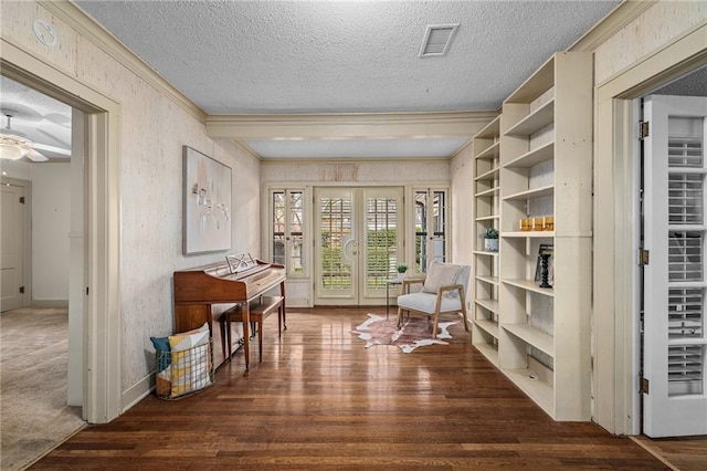 6721 Santa Fe Dr, Overland Park, KS 66204 - living area with visible vents, wood finished floors, and a textured ceiling