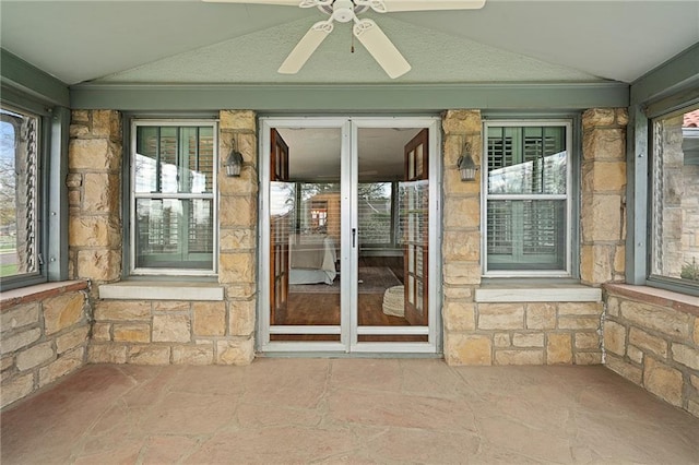 6721 Santa Fe Dr, Overland Park, KS 66204 - doorway to property featuring stone siding and ceiling fan