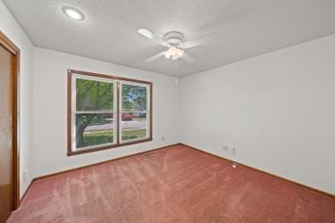 11930 Charlotte St, Kansas City, MO 64146 - unfurnished room featuring carpet floors, ceiling fan, and recessed lighting