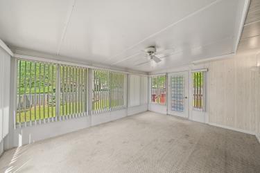 11930 Charlotte St, Kansas City, MO 64146 - view of unfurnished sunroom