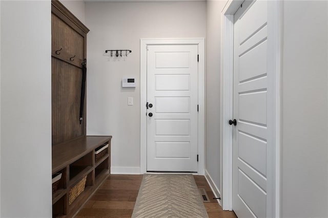 6604 NW 107th Ct, Kansas City, MO 64154 - mudroom with baseboards and dark wood finished floors