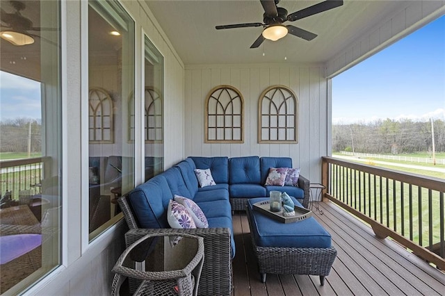 6604 NW 107th Ct, Kansas City, MO 64154 - wooden terrace featuring ceiling fan and an outdoor hangout area