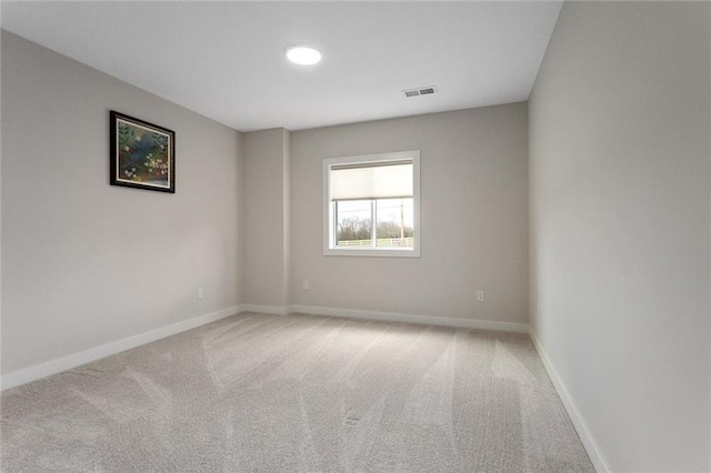 6604 NW 107th Ct, Kansas City, MO 64154 - carpeted spare room featuring baseboards and visible vents