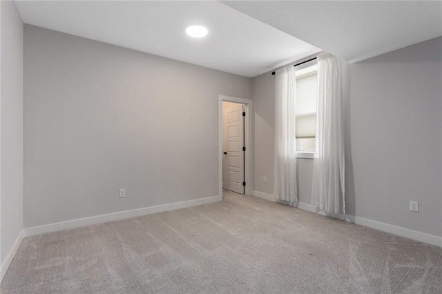 6604 NW 107th Ct, Kansas City, MO 64154 - carpeted spare room with recessed lighting and baseboards