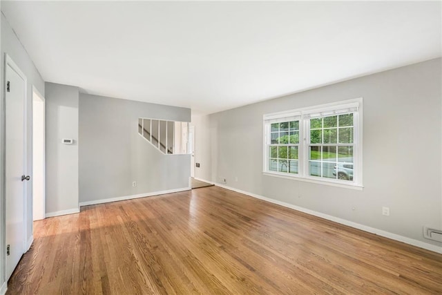 3600 W 48th St, Roeland Park, KS 66205 - spare room with wood finished floors and baseboards