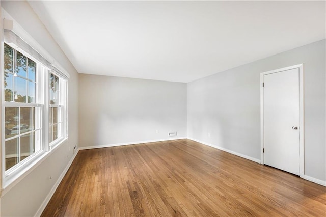 3600 W 48th St, Roeland Park, KS 66205 - spare room with baseboards and wood finished floors