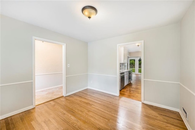 3600 W 48th St, Roeland Park, KS 66205 - unfurnished room with light wood-type flooring and baseboards