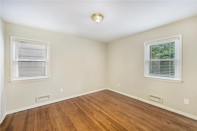 3600 W 48th St, Roeland Park, KS 66205 - empty room with wood finished floors and baseboards