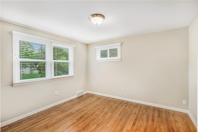 3600 W 48th St, Roeland Park, KS 66205 - unfurnished room with baseboards and light wood-style floors