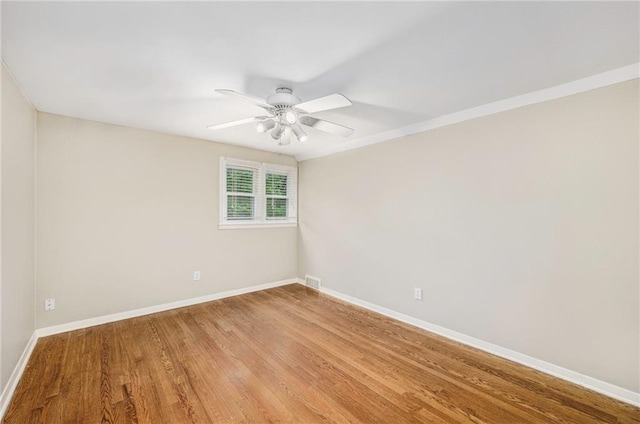 3600 W 48th St, Roeland Park, KS 66205 - spare room with ceiling fan, light wood-style flooring, and baseboards