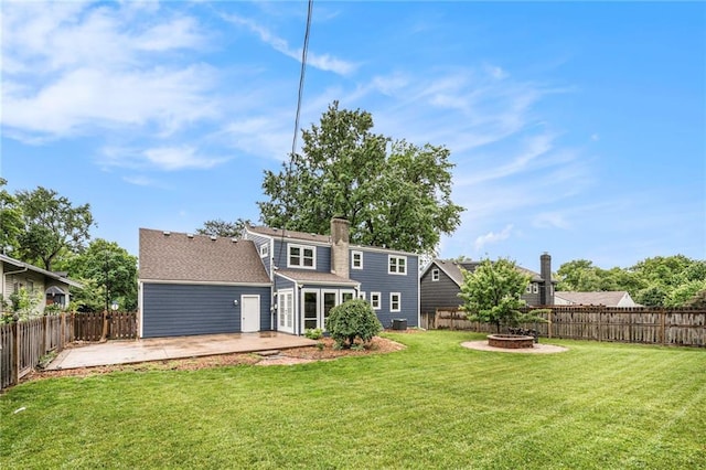 3600 W 48th St, Roeland Park, KS 66205 - back of house with a patio area, a fire pit, and a chimney