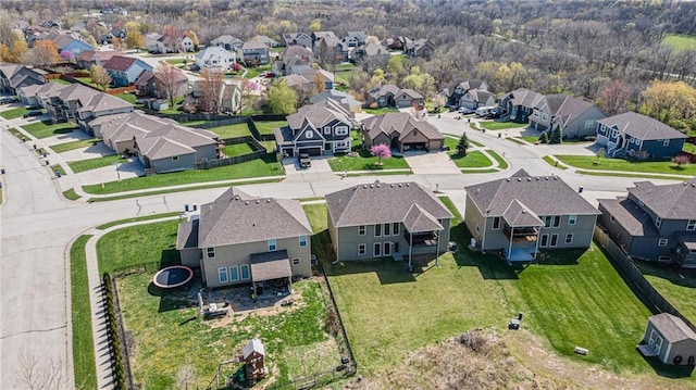 birds eye view of property with a residential view