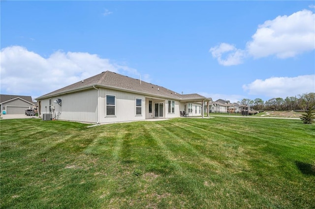 19703 W 196th St, Spring Hill, KS 66083 - rear view of house featuring a lawn
