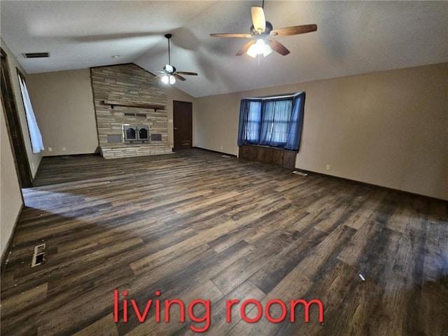 415 N Western St, Girard, KS 66762 - unfurnished living room with ceiling fan, visible vents, lofted ceiling, baseboards, and dark wood-style floors