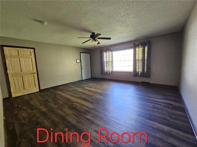 415 N Western St, Girard, KS 66762 - empty room with baseboards, a textured ceiling, a ceiling fan, and dark wood finished floors