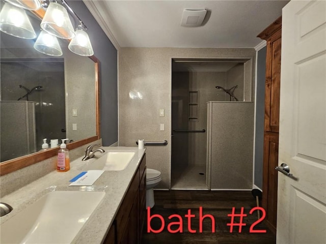 415 N Western St, Girard, KS 66762 - bathroom with a walk in shower, a sink, and toilet