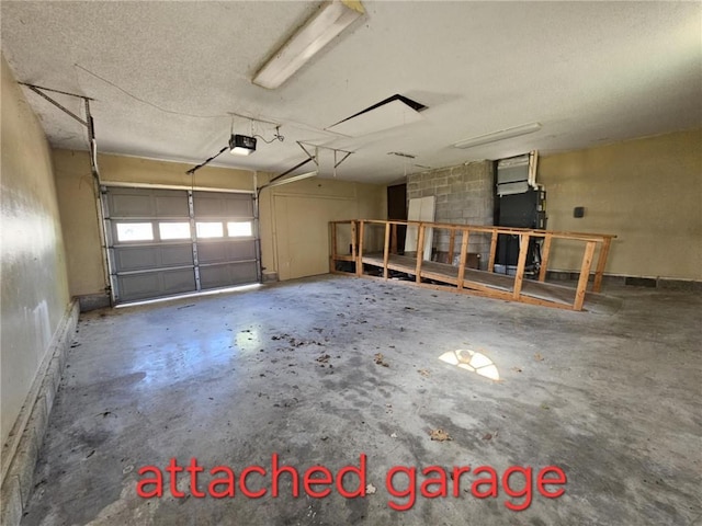 415 N Western St, Girard, KS 66762 - garage featuring a garage door opener