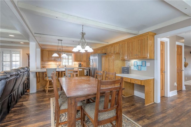 dining area with beamed ceiling, a notable chandelier, dark wood finished floors, and baseboards