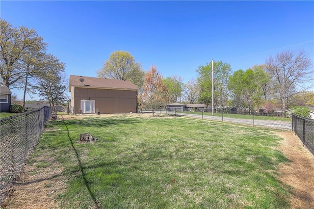 view of yard featuring a fenced backyard
