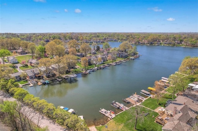 bird's eye view featuring a residential view and a water view