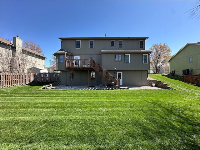 1200 Susan St, Kearney, MO 64060 - back of property with stairs, a patio, a deck, and central air condition unit