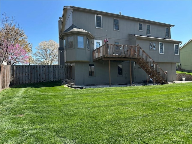 1200 Susan St, Kearney, MO 64060 - back of house with stairs and a wooden deck