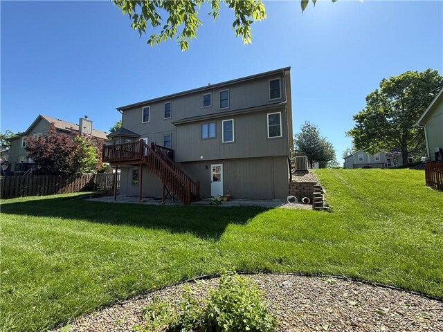 1200 Susan St, Kearney, MO 64060 - back of house with stairway, a wooden deck, and central air condition unit