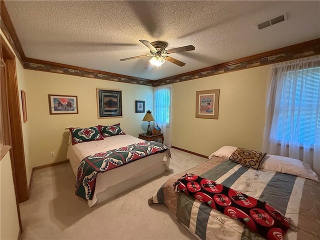 1200 Susan St, Kearney, MO 64060 - bedroom featuring light carpet, a textured ceiling, baseboards, a ceiling fan, and crown molding